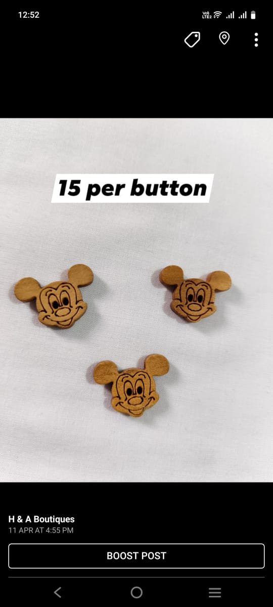 Close-up of Wooden Mickey Buttons – fun cartoon accessory for kidswear by HnA Boutique Pakistan