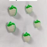 Close-up of White Strawberries funky buttons – playful detail for kidswear and casual fashion by HnA Boutique Pakistan