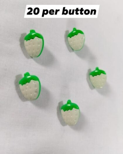 Close-up of White Strawberries funky buttons – playful detail for kidswear and casual fashion by HnA Boutique Pakistan