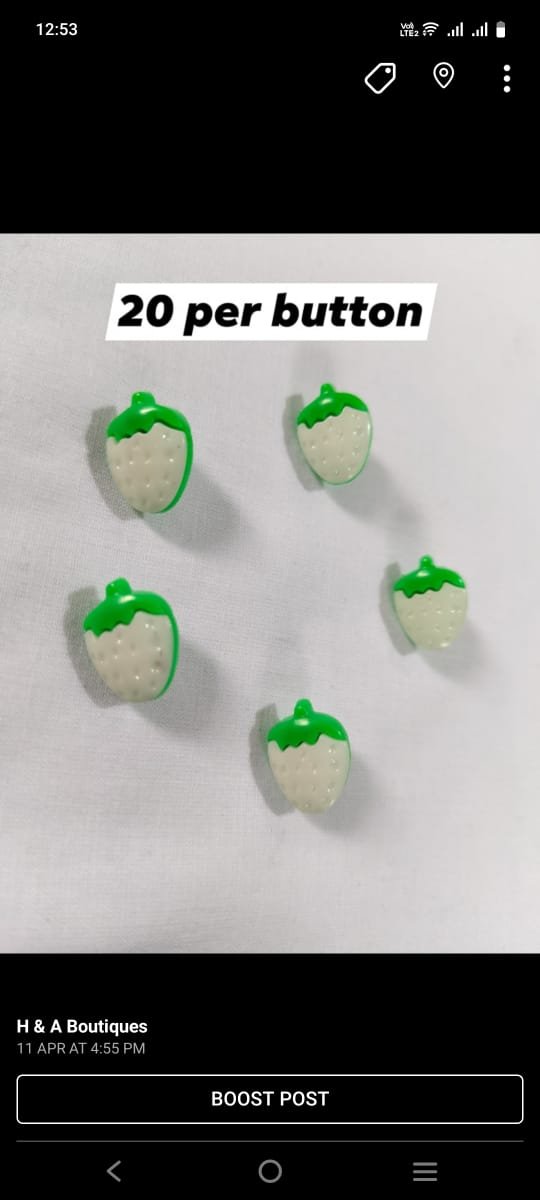 Close-up of White Strawberries funky buttons – playful detail for kidswear and casual fashion by HnA Boutique Pakistan