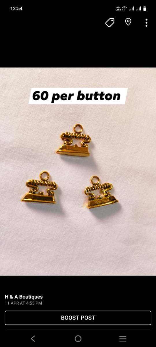 Close-up of Metal Iron Buttons – retro-style funky accessory from HnA Boutique Pakistan