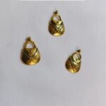 Close-up of Metal Bag Buttons – funky metal embellishments for handbags and jackets from HnA Boutique Pakistan