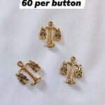 Close-up of Metal Scale Buttons showing textured scale pattern – HnA Boutique Pakistan
