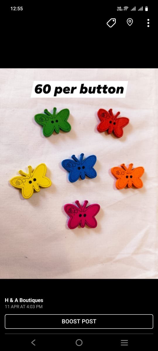 Close-up of colorful multi butterflies wooden buttons – HnA Boutique Pakistan