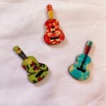 Close-up of Guitar Mix 1 wooden buttons – funky musical DIY accessory by HnA Boutique Pakistan
