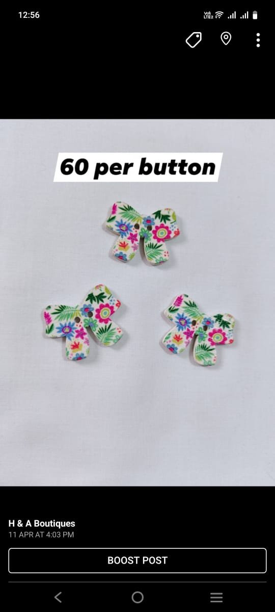 Close-up of Lively Bow wooden buttons – elegant funky accessory by HnA Boutique Pakistan