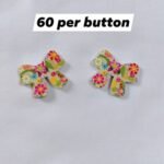 Close-up of Floral Bow wooden buttons with floral design – HnA Boutique Pakistan