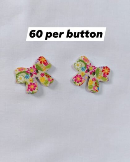 Close-up of Floral Bow wooden buttons with floral design – HnA Boutique Pakistan