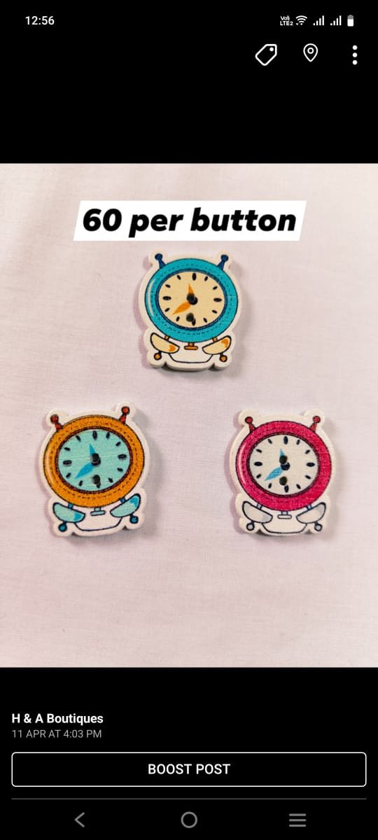Close-up of Alarm Clock 1 wooden button with detailed design – HnA Boutique Pakistan