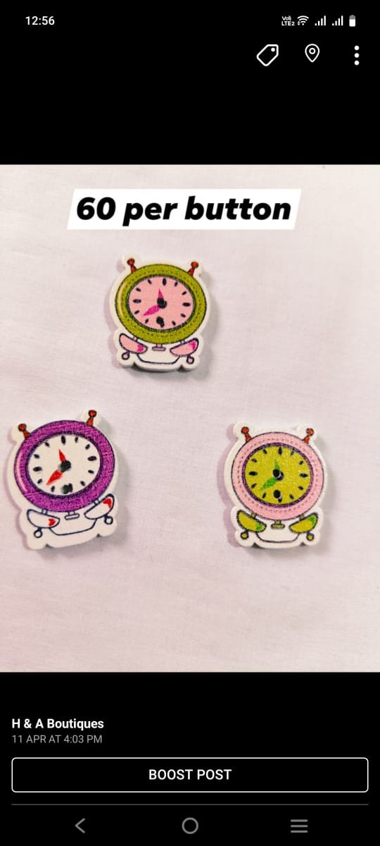 Close-up of Alarm Clock wooden button with quirky design – HnA Boutique Pakistan