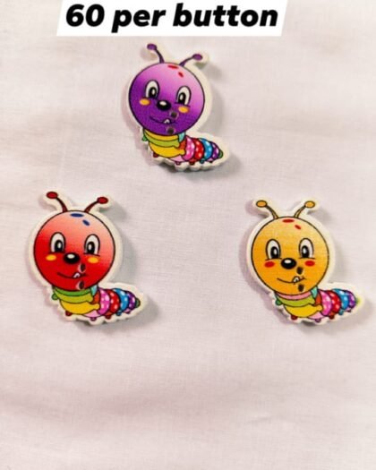 Close-up of Caterpillar 1 wooden buttons with detailed design – HnA Boutique Pakistan