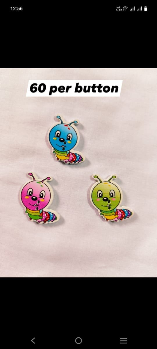 Close-up of caterpillar-shaped wooden buttons – Caterpillar Buttons by HnA Boutique Pakistan