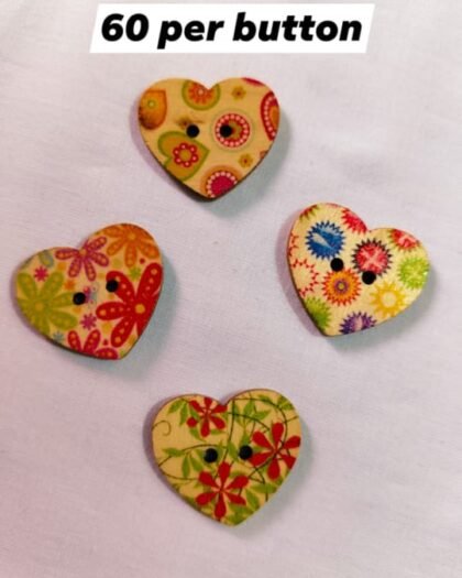 Close-up of Vintage Heart wooden buttons with intricate heart design – HnA Boutique Pakistan