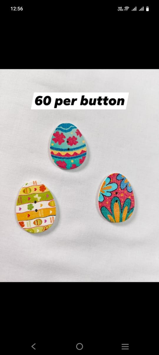 Front view of Easter Egg Wooden Buttons – colorful festive buttons for fashion and crafts – HnA Boutique Pakistan