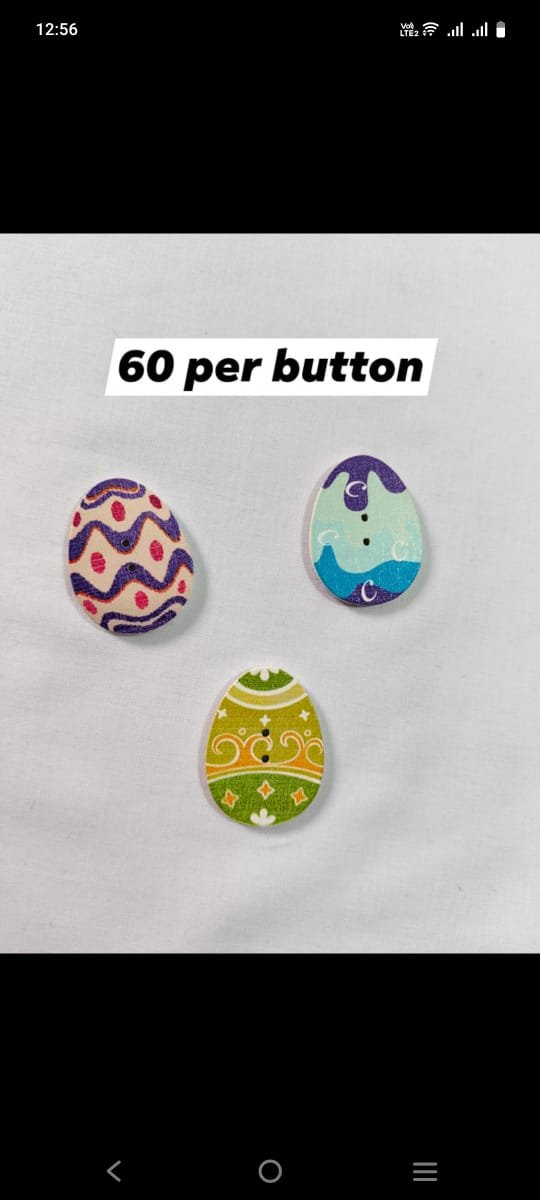 Front view of Easter Egg2 Wooden Buttons with colorful dotted pattern – HnA Boutique Pakistan