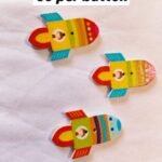 Front view of Rocket 1 Wooden Button with vibrant rocket design – HnA Boutique Pakistan