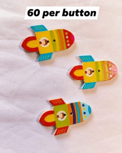 Front view of Rocket 1 Wooden Button with vibrant rocket design – HnA Boutique Pakistan