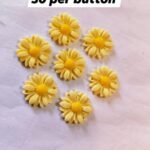 Close-up of Yellow Sunflower Buttons with bright yellow floral design – HnA Boutique Pakistan