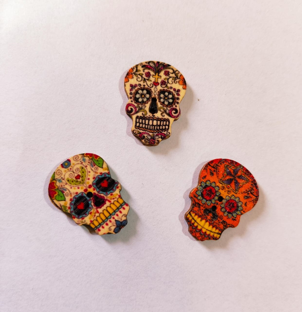Close-up of funky Skull Buttons in black and silver – HnA Boutique Pakistan